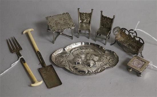 A collection of Continental silver miniature furniture and other small silver items,